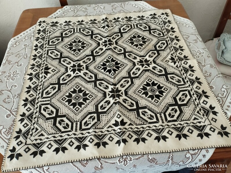 Black and white embroidered tablecloth
