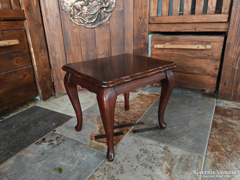 Small wooden table in neobaroque style