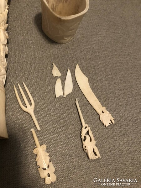 Bone colored ornaments in one