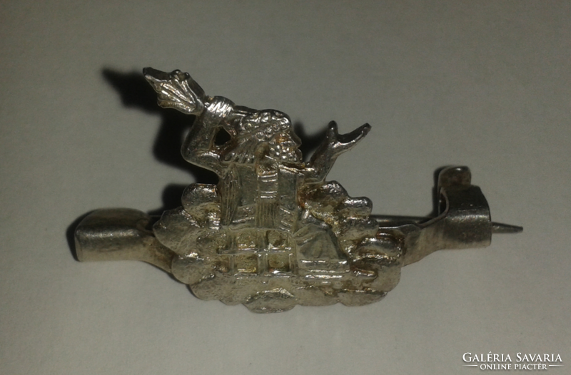 Old silver or silver-plated figure brooch (marked)