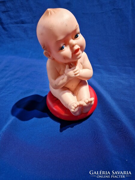Retro toy doll laughing