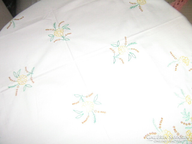 Beautiful yellow floral hand embroidered fringed tablecloth