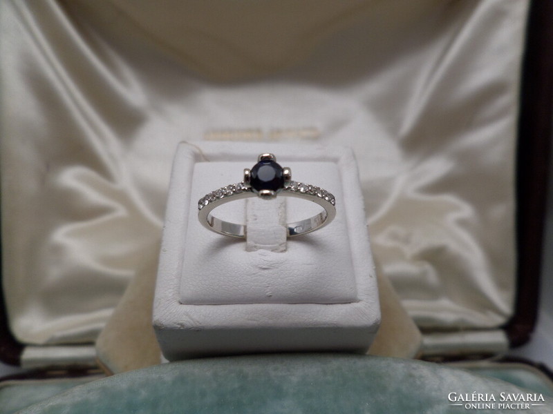 White gold ring with blue sapphires