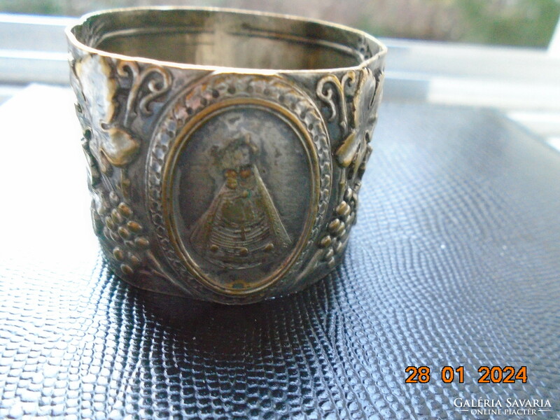 Répoussé silver-plated copper napkin ring with Mary baby Jesus and rich grape decoration