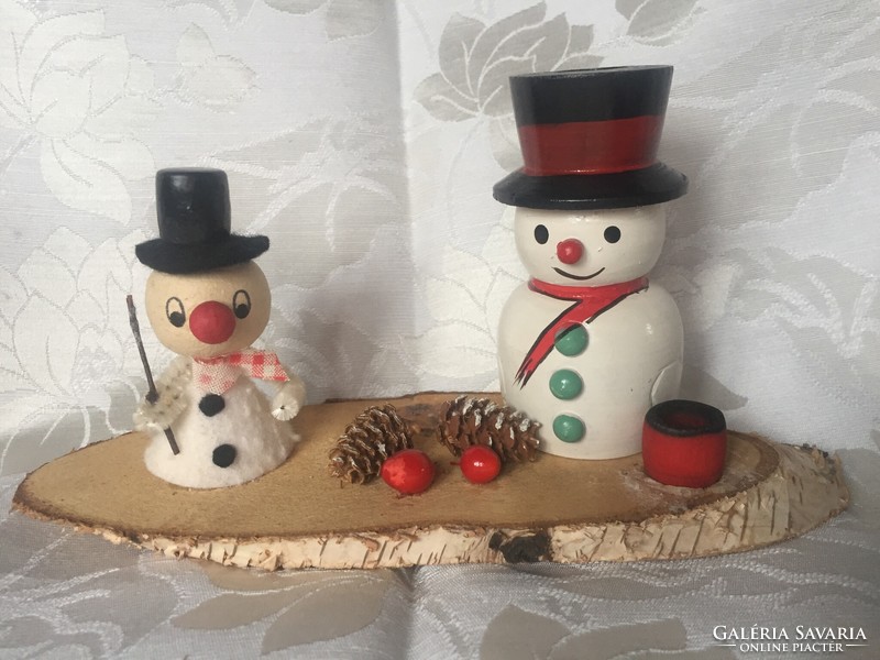 Old, retro Christmas table decoration, candle holder with wood, chenille and paper snowman decoration