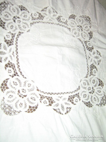 Wonderful ribbon embroidered on special snow-white lace tablecloth