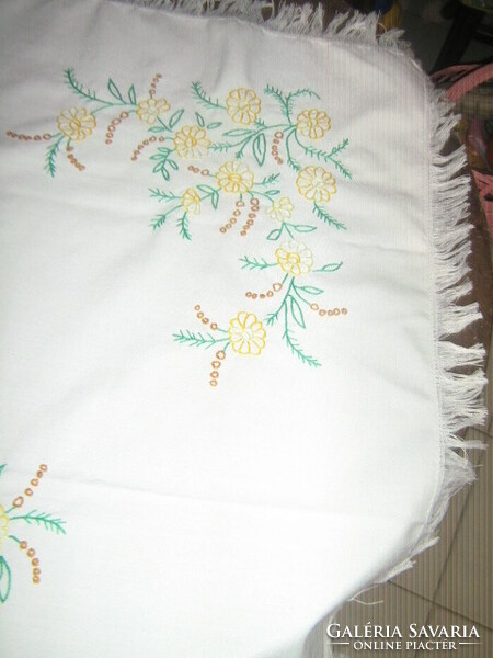 Beautiful yellow floral hand embroidered fringed tablecloth