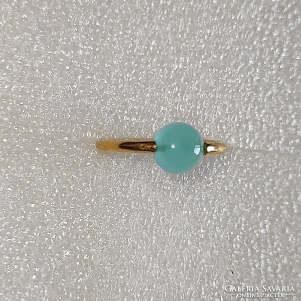 A wonderful gold-plated ring with a mint-colored stone! The stone can be rotated (56)