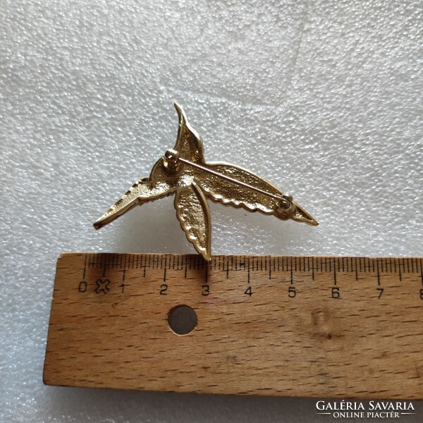 A wonderful gold plated pin