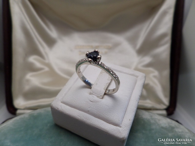 White gold ring with blue sapphires