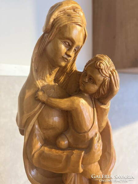 Carved, lacquered wooden statue of Mary with baby Jesus