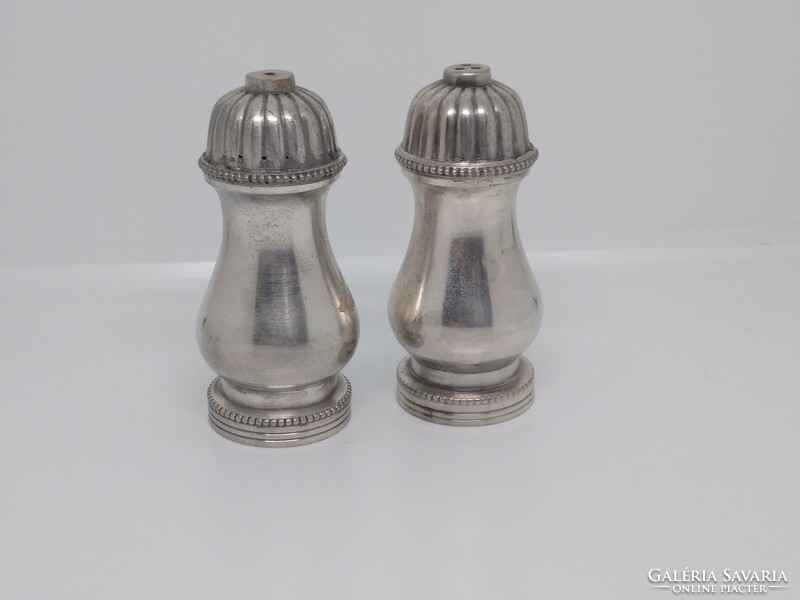 Pair of retro metal salt shakers and pepper shakers