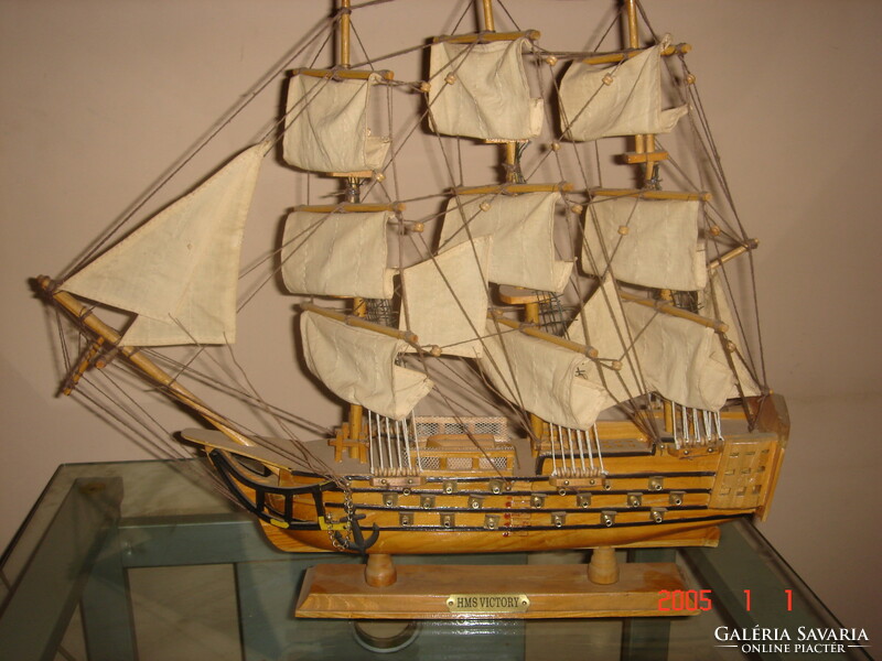 A three-masted sailing ship