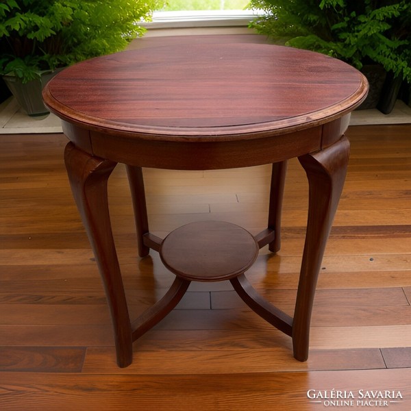 Art deco style circular mahogany coffee table