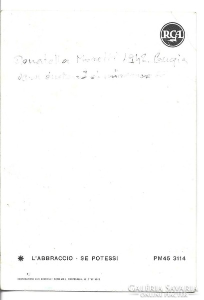 Donatella Moretti olasz énekesnő autográf, dedikált, sajátkezű aláírása fotólapon.