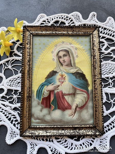 Old holy image, image of the Virgin Mary in a patinated metal frame