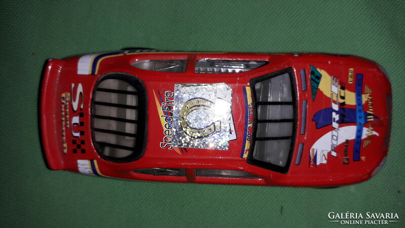 Retro 1:43 red ford thunder rally gt car with many stickers in good condition according to the pictures