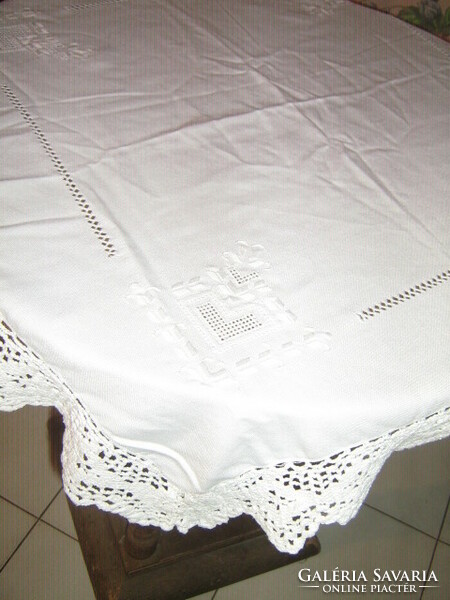 White embroidered azure tablecloth with a beautiful hand crocheted edge