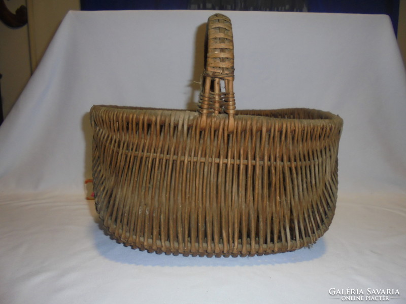 Old cane wicker market basket, rake - piece of nostalgia