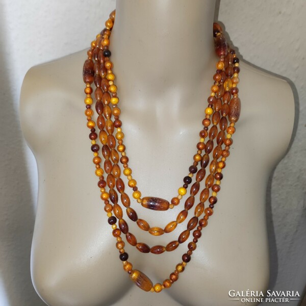 2 necklaces with an amber effect without a switch