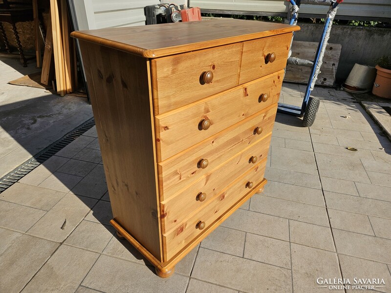 Stained pine chest of drawers in good condition for sale.
