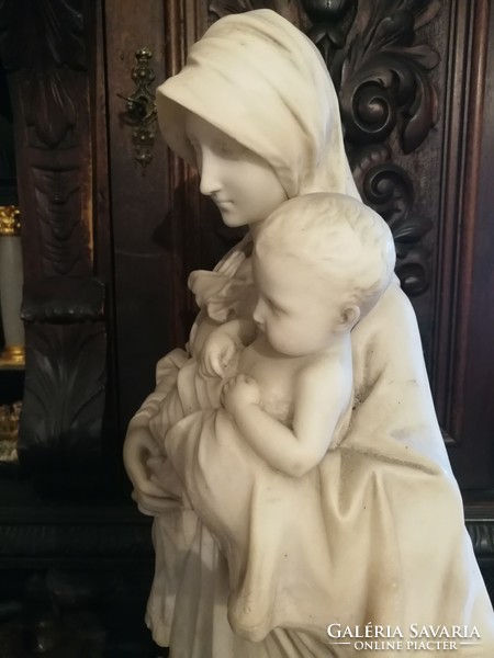 Marble statue of the Virgin Mary with her child