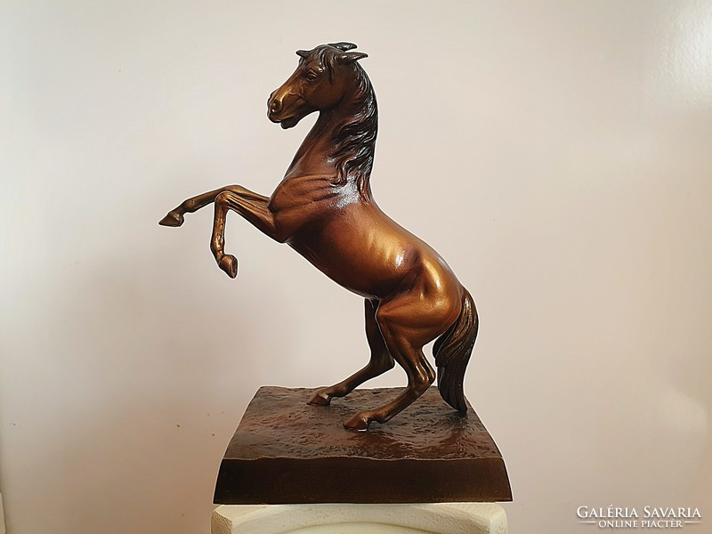 Beautiful bronzed iron cast horse sculpture