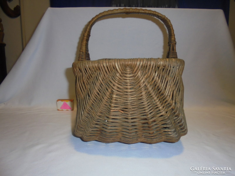 Old cane wicker market basket, rake - piece of nostalgia