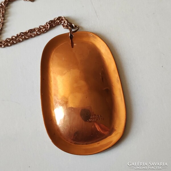 Marked red copper moda pendant on a chain worth 12,000