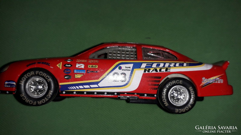 Retro 1:43 red ford thunder rally gt car with many stickers in good condition according to the pictures