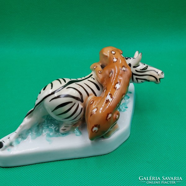 Hunting scene, leopard and zebra porcelain figure