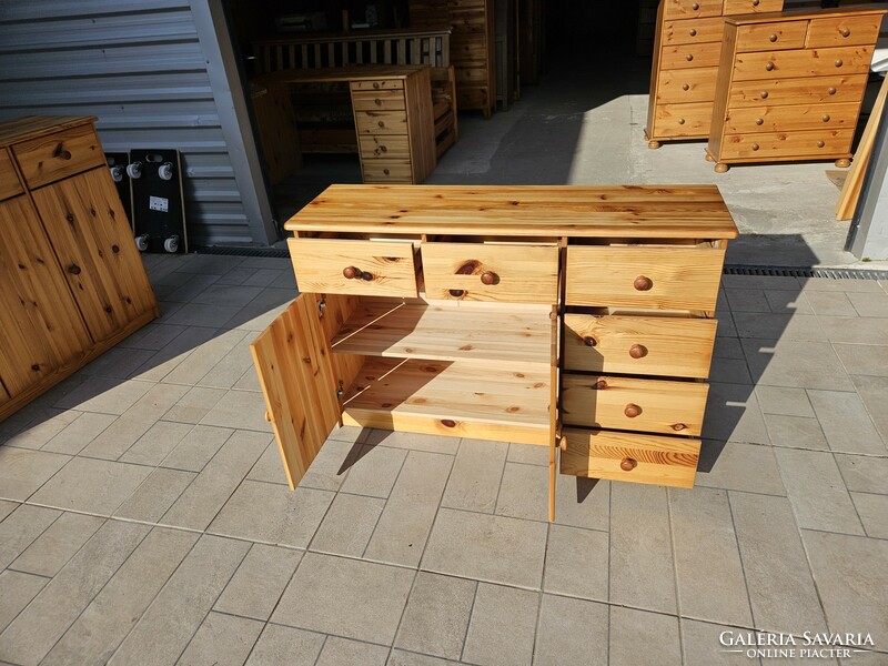 Three-door, three-drawer pine dresser in good condition for sale.