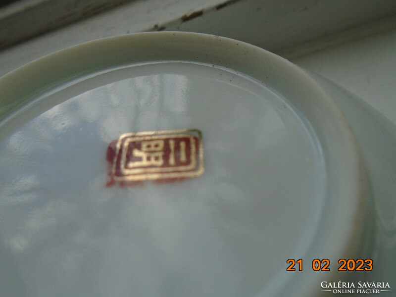 Antique hand-painted, gold-contoured eggshell porcelain Japanese bowl with a pair of birds and a flower pattern