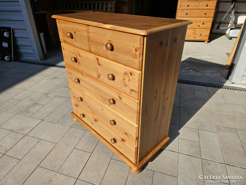 Stained pine chest of drawers in good condition for sale.