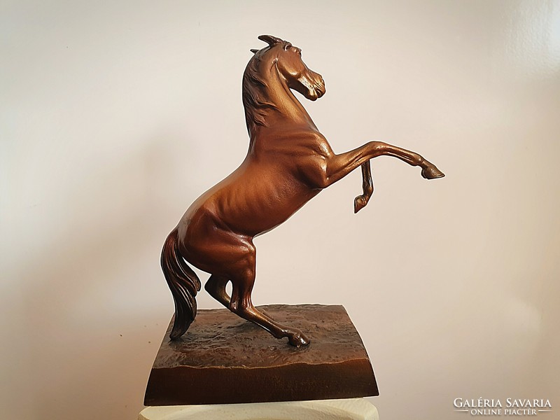 Beautiful bronzed iron cast horse sculpture