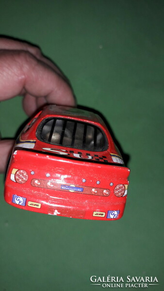 Retro 1:43 red ford thunder rally gt car with many stickers in good condition according to the pictures