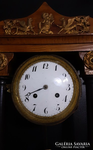 Empire mantel clock, cherry veneer. Four columns.