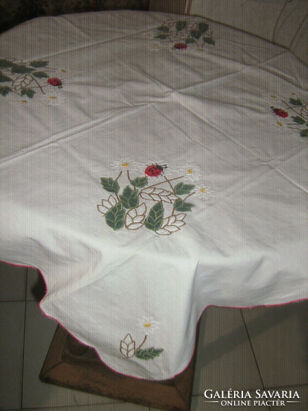 Beautiful applique ladybug and flower patterned tablecloth