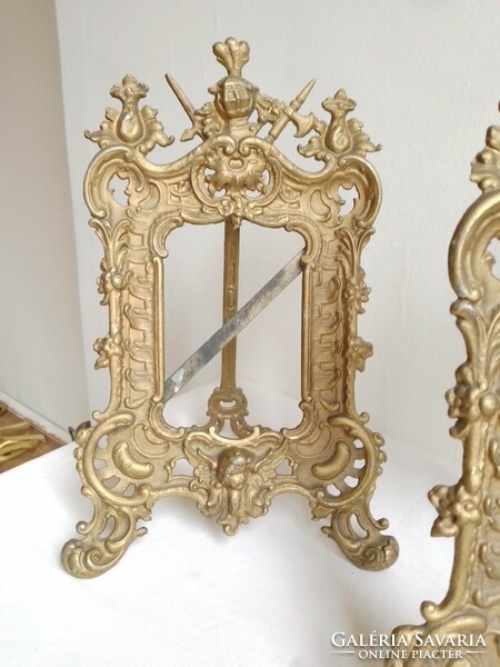 Two antique old cast iron table decorative picture frames with a pair of supports, angelic and complete