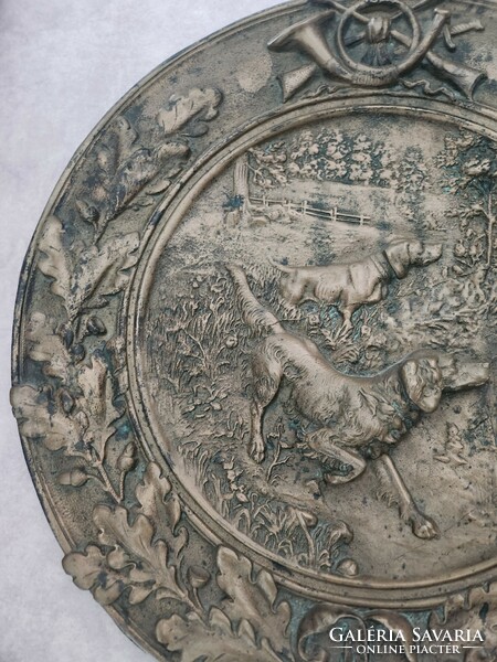 Bronze plate with a hunting scene