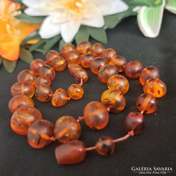 Old handmade amber necklaces.