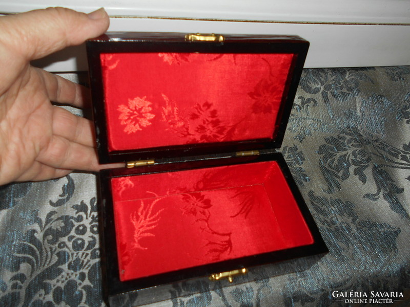 Chinese lacquer box with a cork miniature insert on the top and a jewelry holder