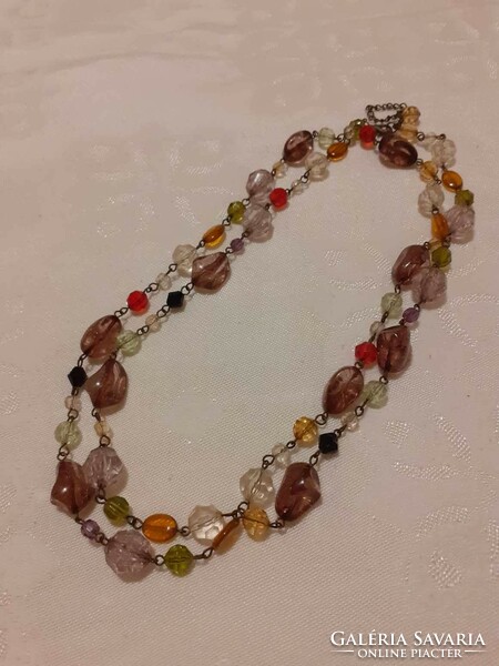 Showy necklace made of colored glass and acrylic beads