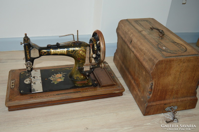 Antique German Kohler portable sewing machine with box and key from the 1800s