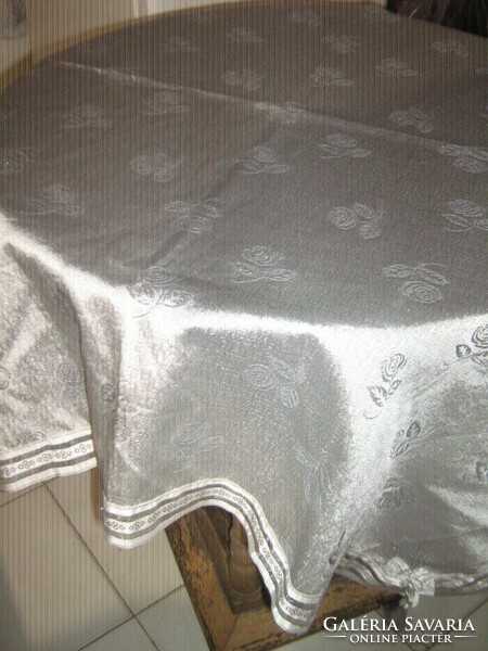 Beautiful tablecloth with a beautiful silver rose