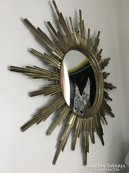 Old metal sun mirror with glass convex mirror