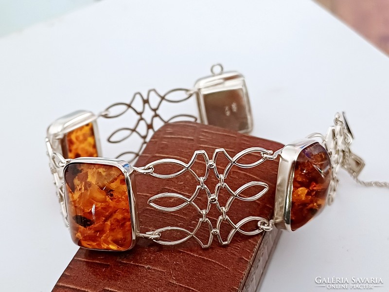 Wide antique silver bracelet with amber