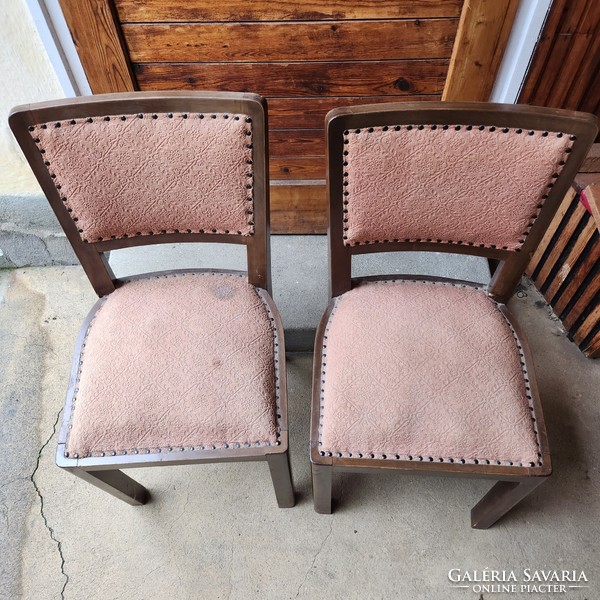 Two chairs with spring cushions