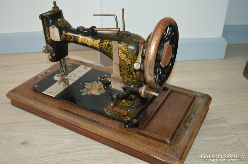 Antique German Kohler portable sewing machine with box and key from the 1800s
