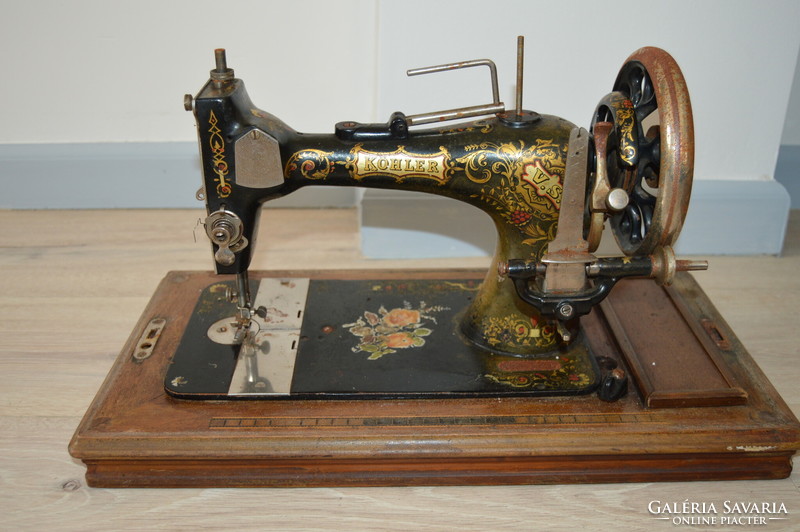 Antique German Kohler portable sewing machine with box and key from the 1800s